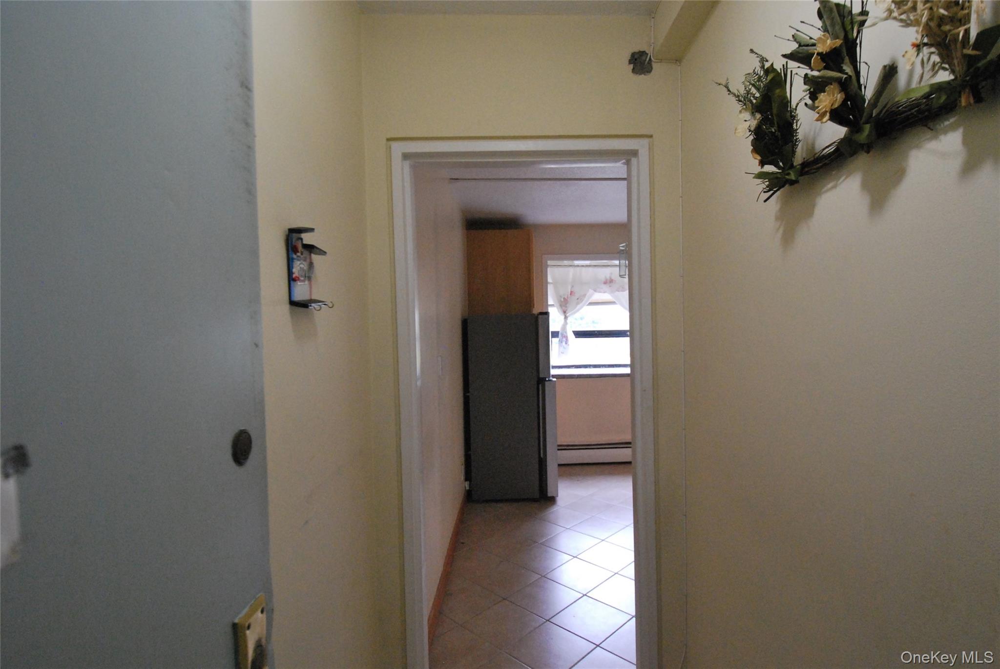 1523 Central Park Avenue, Unit 5F Yonkers, NY 10710 - Photo 2 of 20 a view of a hallway with a room