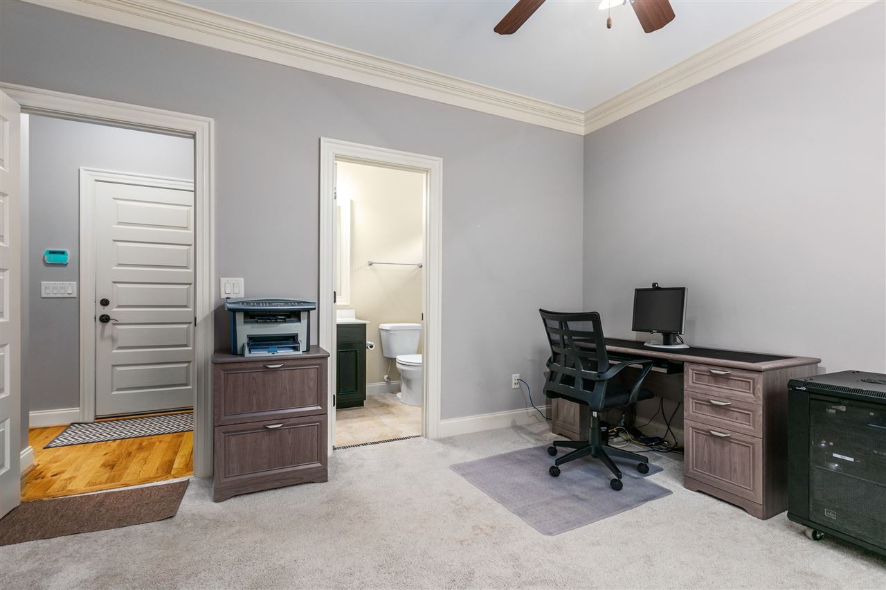 421 Redhill Road Holly Springs, NC 27540 - Photo 5 of 30 Main floor bedroom currently being used as an office has a full bath. Main Floor Bedroom