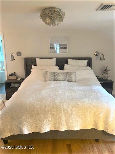 8 Perry Place Riverside, CT 06878 - Photo 13 of 26 a large white bed in a small room