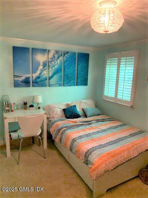 8 Perry Place Riverside, CT 06878 - Photo 16 of 26 a bedroom with a bed and a window