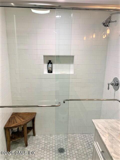 8 Perry Place Riverside, CT 06878 - Photo 17 of 26 a bathroom with a sink a toilet and shower