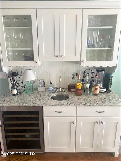 8 Perry Place Riverside, CT 06878 - Photo 6 of 26 a kitchen with granite countertop a sink cabinets and window