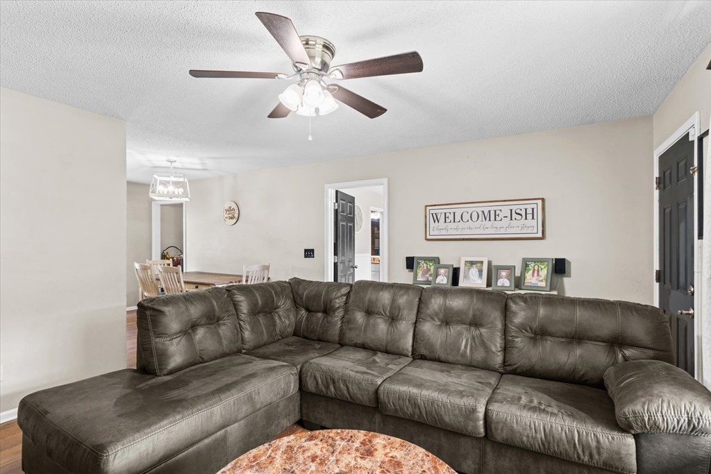 2326 Waring Road Northwest Dalton, GA 30721 - Photo 11 of 41 a living room with furniture and a ceiling fan