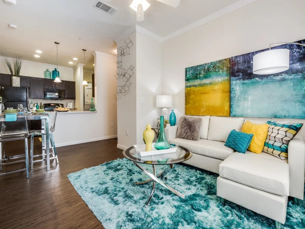 14722 Nacogdoches Road, Unit 3213 San Antonio, TX 78247 - Photo 7 of 22 a living room with furniture and a wooden floor