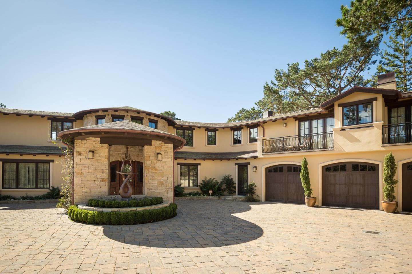 3164 Palmero Way Pebble Beach, CA 93953 - Photo 1 of 24 a front view of a house with a yard