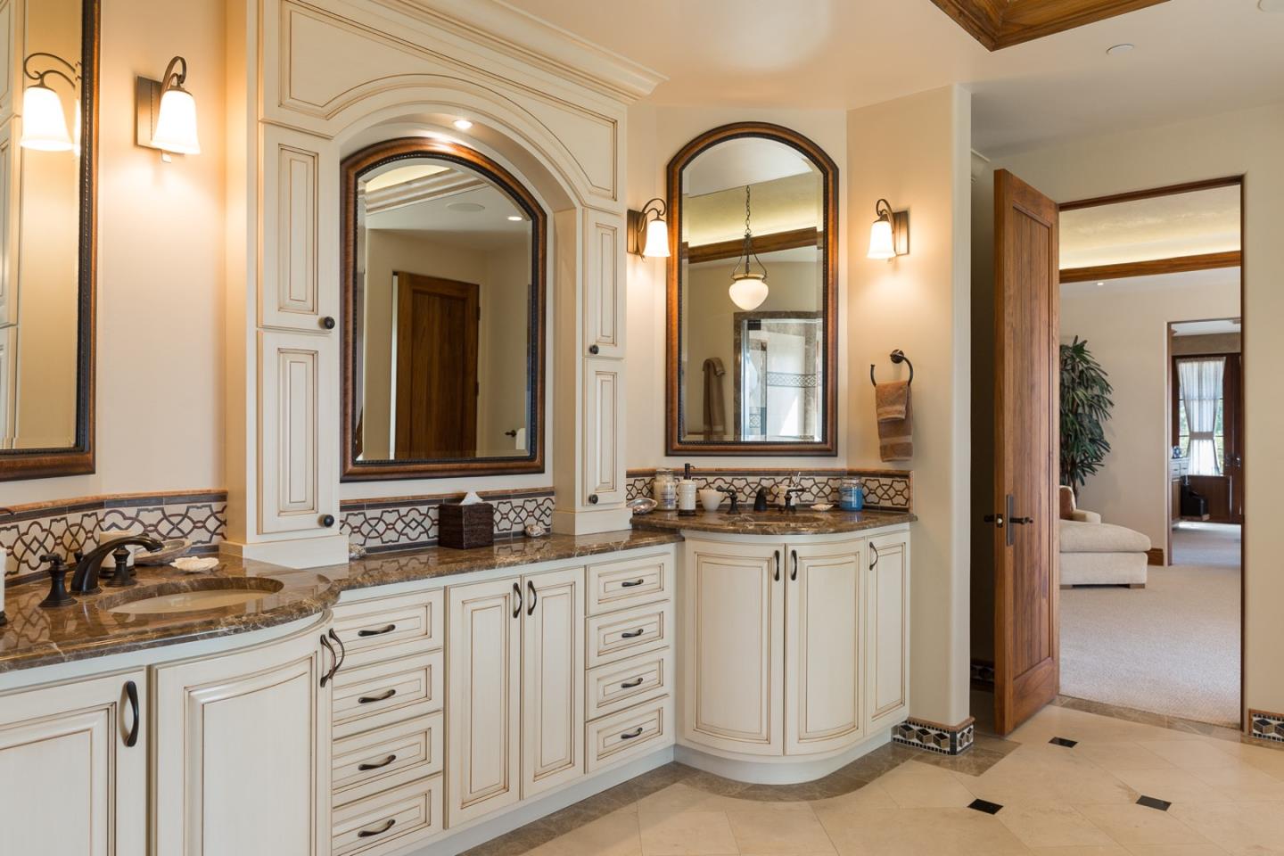 3164 Palmero Way Pebble Beach, CA 93953 - Photo 17 of 24 a spacious bathroom with double sink and a mirror