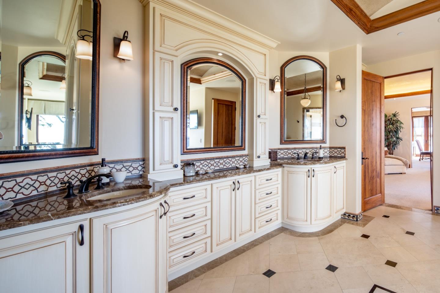 3164 Palmero Way Pebble Beach, CA 93953 - Photo 23 of 24 a bathroom with mirror a sink and a window