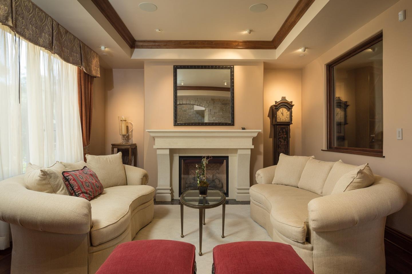 3164 Palmero Way Pebble Beach, CA 93953 - Photo 7 of 24 a living room with furniture and a fireplace