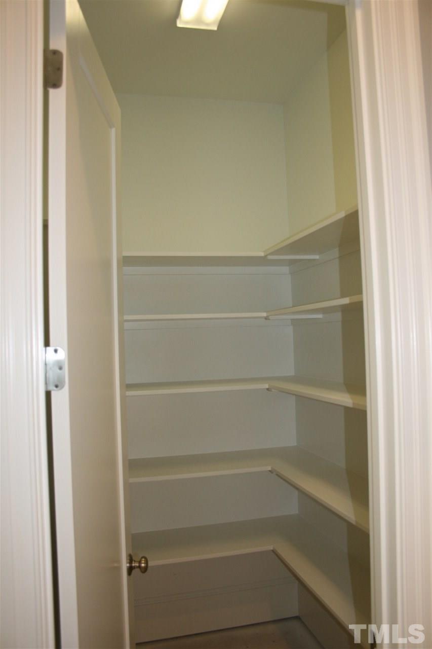 8703 Duckview Court Raleigh, NC 27613 - Photo 6 of 16 a view of a closet