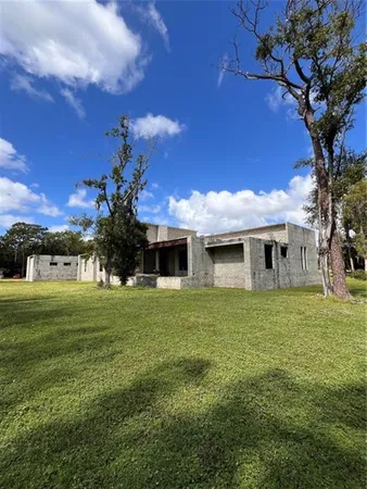 a view of a house with a big yard