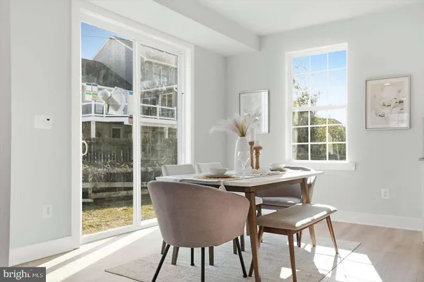 a view of a table and chairs in a room