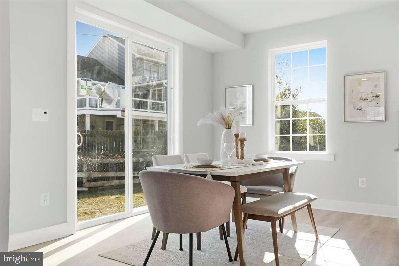 533 Forest View Road Linthicum Heights, MD 21090 - Photo 12 of 20 a view of a table and chairs in a room