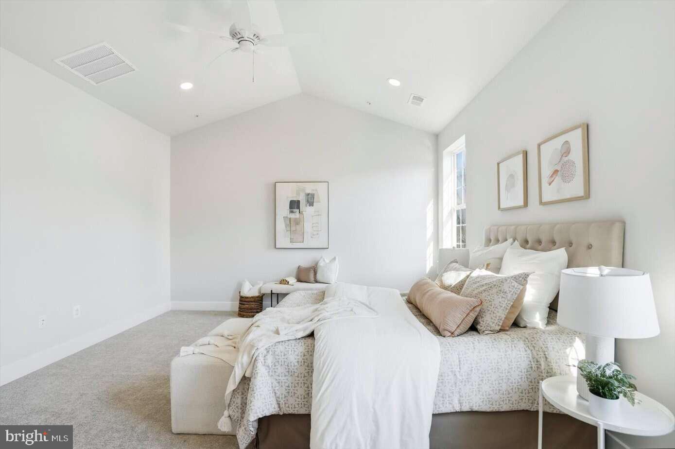 533 Forest View Road Linthicum Heights, MD 21090 - Photo 15 of 20 a bedroom with a bed and a couch