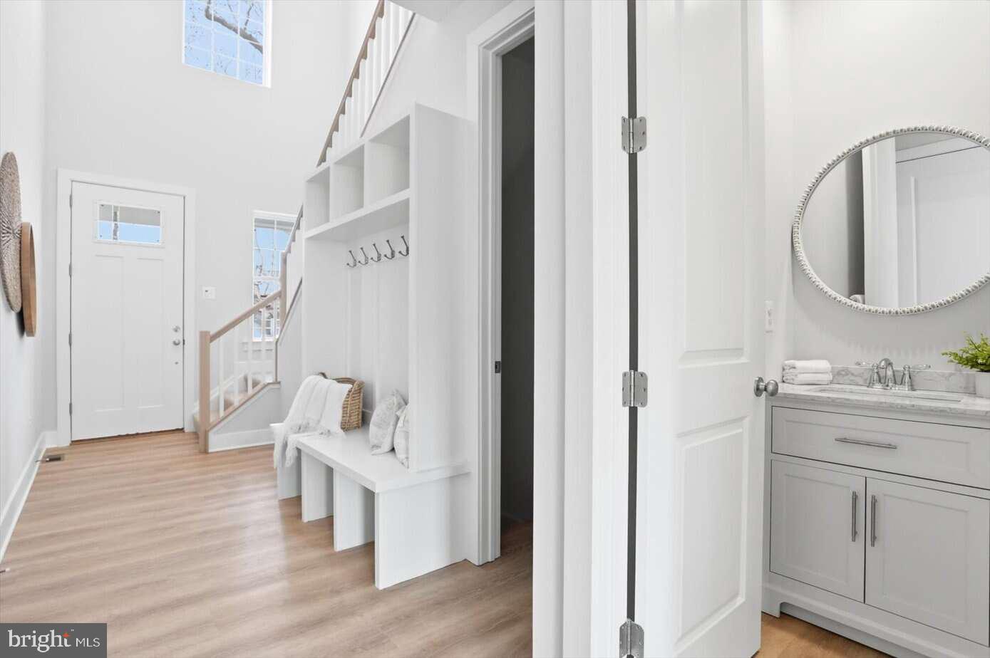 533 Forest View Road Linthicum Heights, MD 21090 - Photo 3 of 20 a bathroom with a sink and a mirror