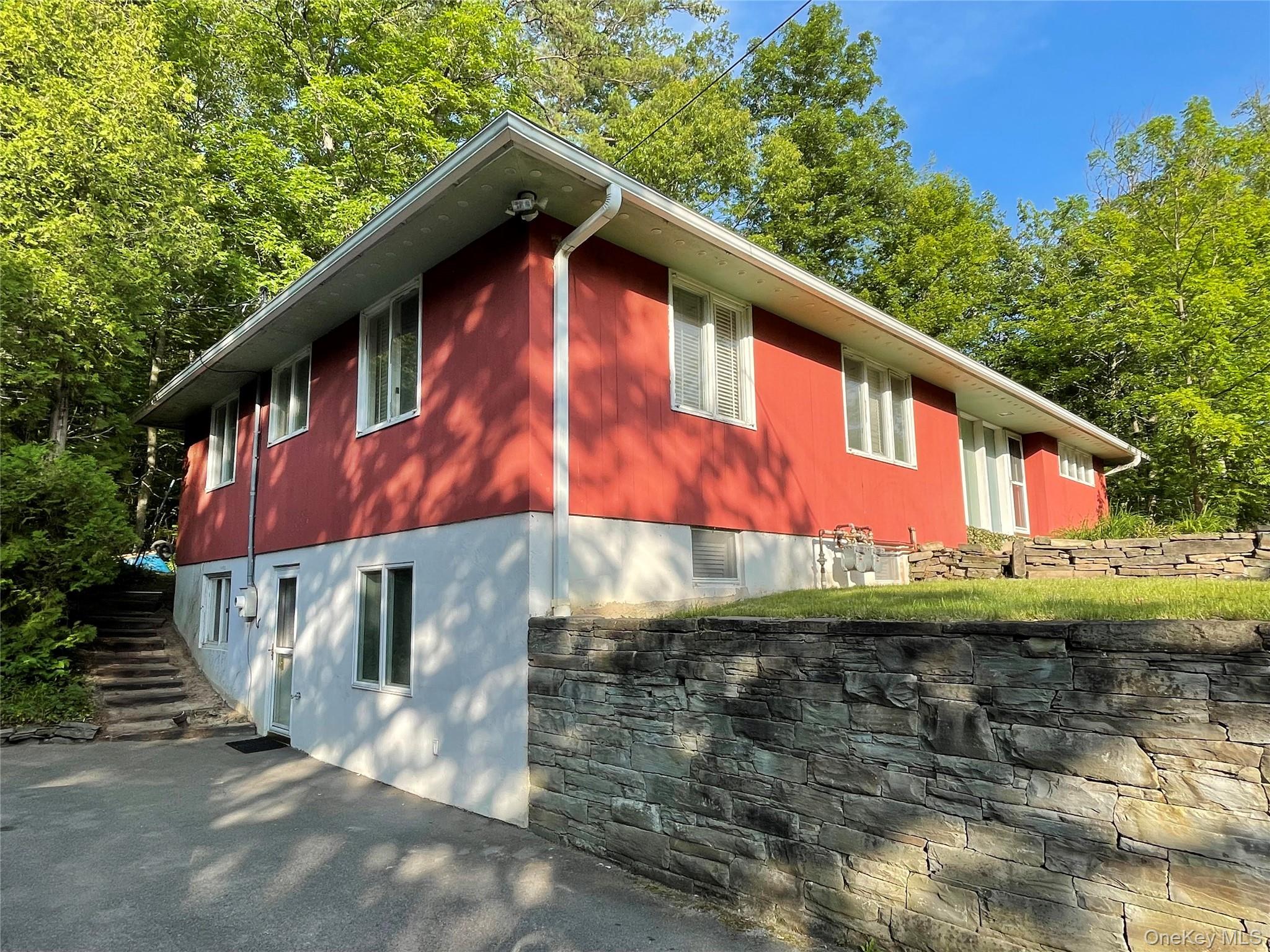 419 Triphammer Road Ithaca, NY 14850 - Photo 1 of 26 a backyard of a house with a yard