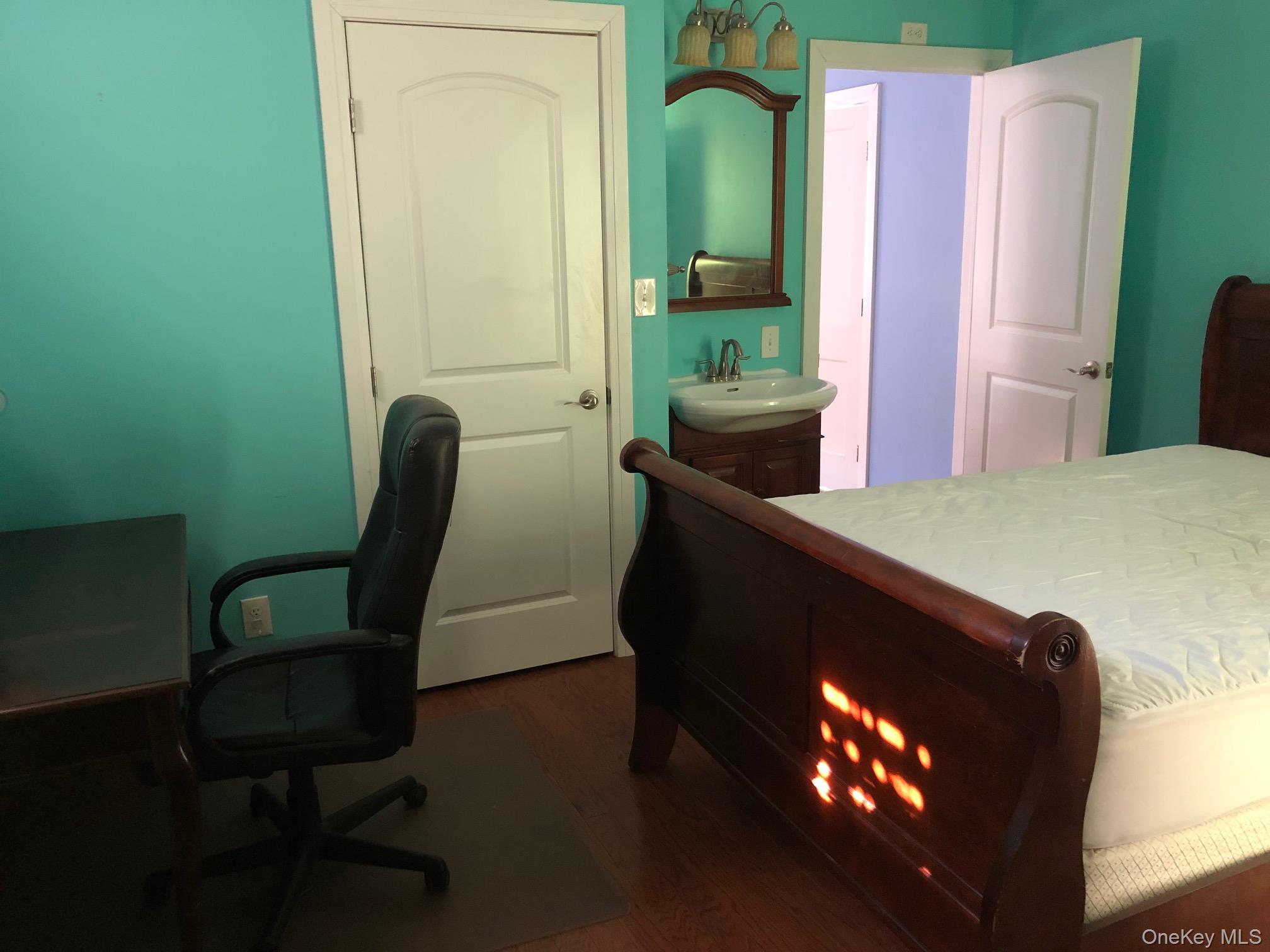 419 Triphammer Road Ithaca, NY 14850 - Photo 25 of 26 a view of a workspace with furniture and a window