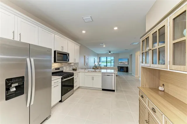 a view of storage and utility room with washer and dryer