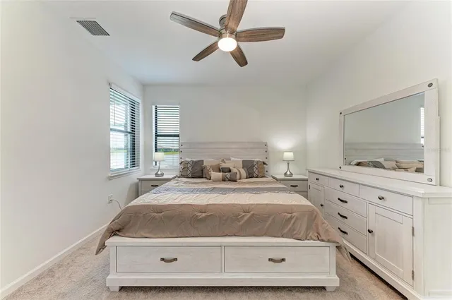 a view of a swimming pool and lounge chair