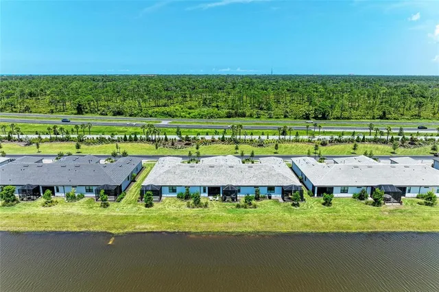 a view of a swimming pool with a garden