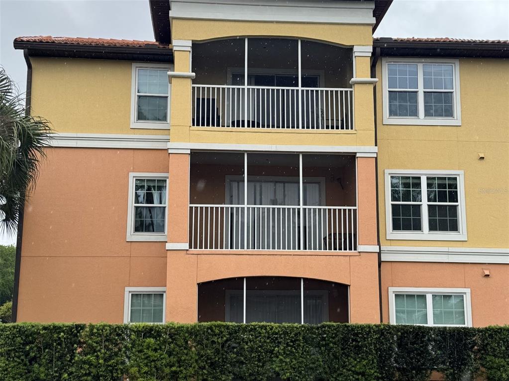 5483 Vineland Road, Unit 10201 Orlando, FL 32811 - Photo 2 of 35 a front view of a house with a window