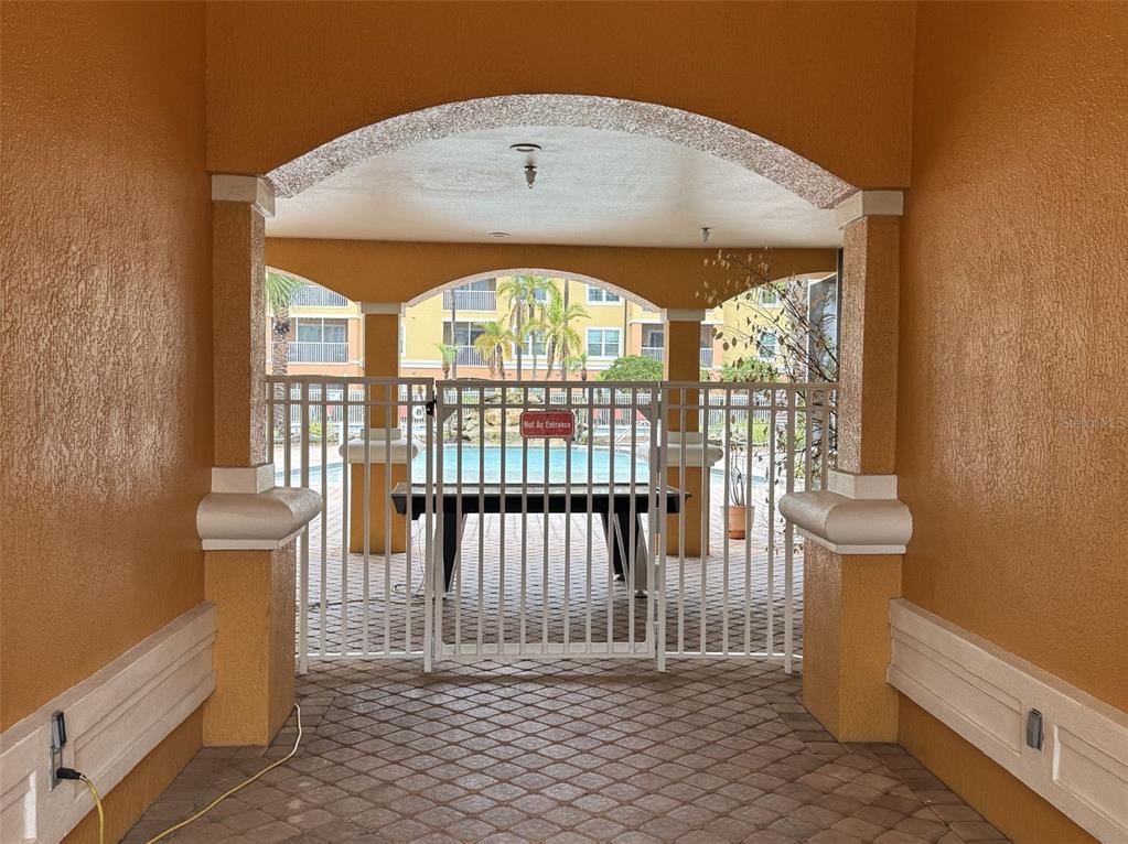 5483 Vineland Road, Unit 10201 Orlando, FL 32811 - Photo 25 of 35 a view of entryway with wooden floor