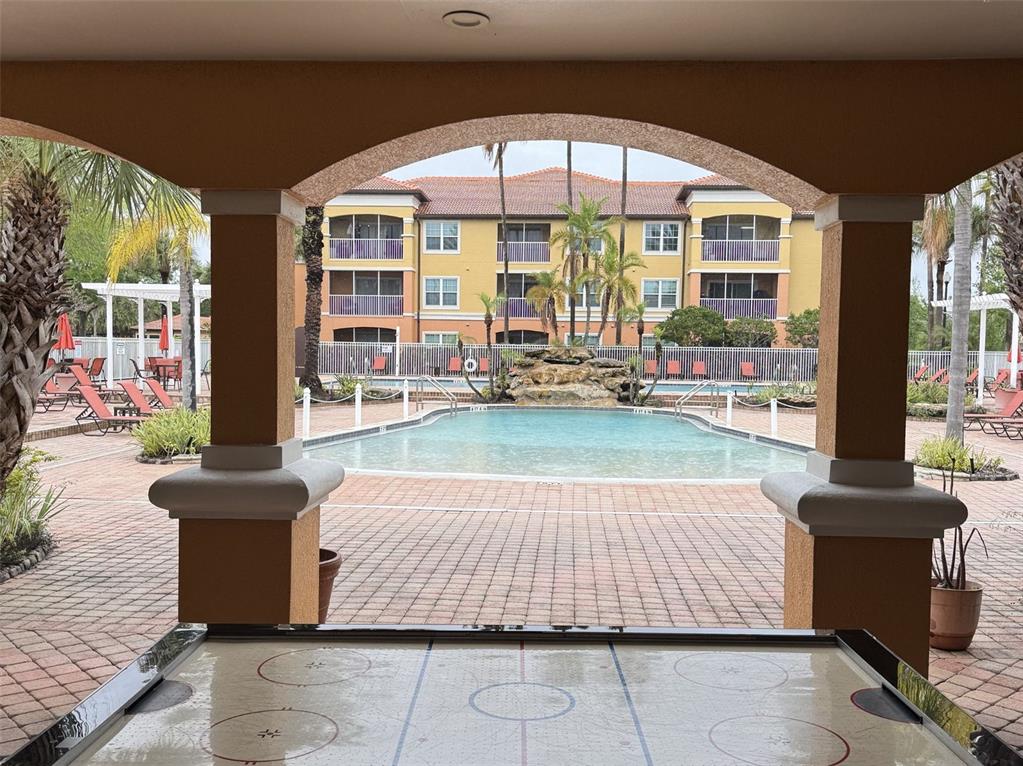 5483 Vineland Road, Unit 10201 Orlando, FL 32811 - Photo 26 of 35 a front view of a building with outdoor seating