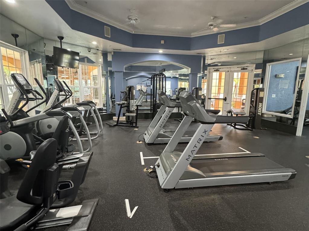 5483 Vineland Road, Unit 10201 Orlando, FL 32811 - Photo 35 of 35 a view of a room with gym equipment