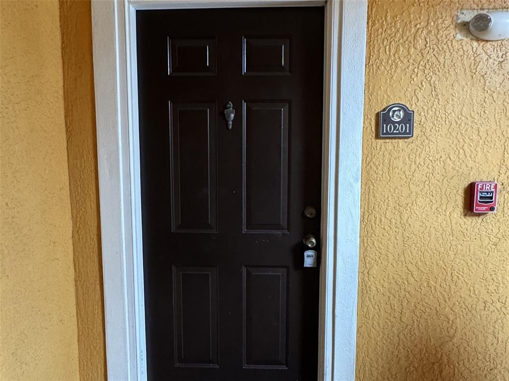 5483 Vineland Road, Unit 10201 Orlando, FL 32811 - Photo 4 of 35 a view of door
