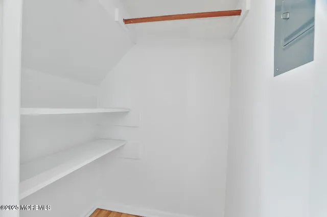 a view of an empty walk in closet