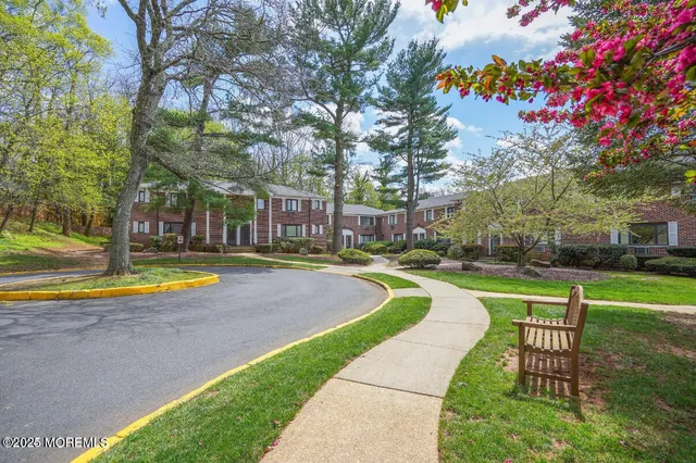a view of a swimming pool with a garden