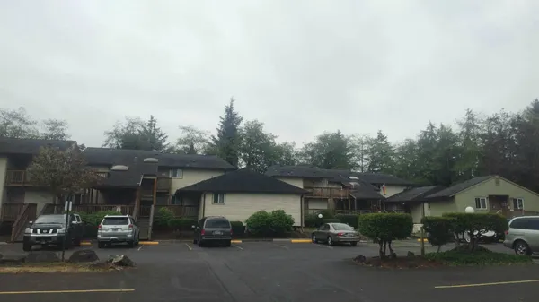 a view of a house with a street