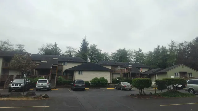 a view of a house with a street