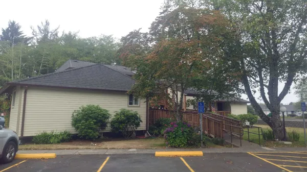 a car parked in front of a house