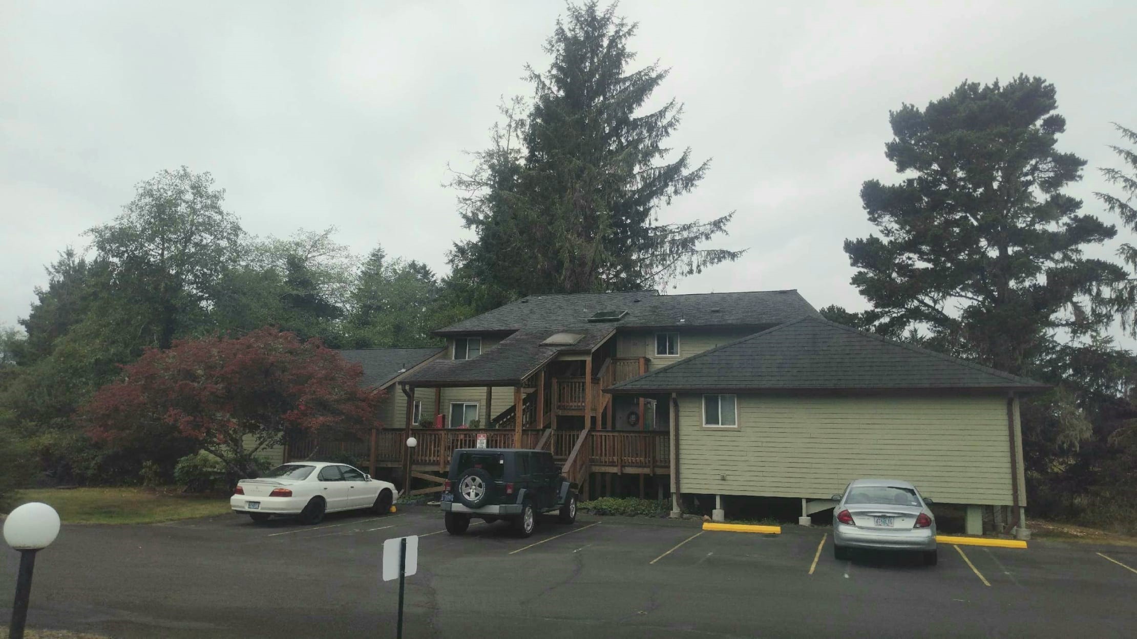 150 South Wahanna Road Seaside, OR 97138 - Photo 6 of 7 a car parked in front of a house