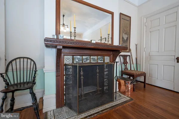 a view of front door with a mirror