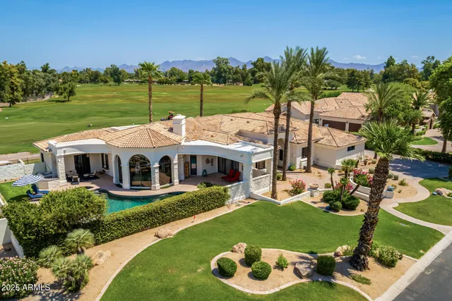 a view of a lake with a house