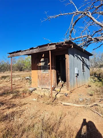 a table and chairs in the patio