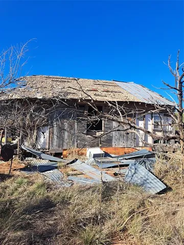 a view of swimming pool with outdoor seating