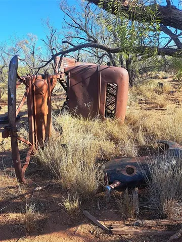 a view of a backyard of the house