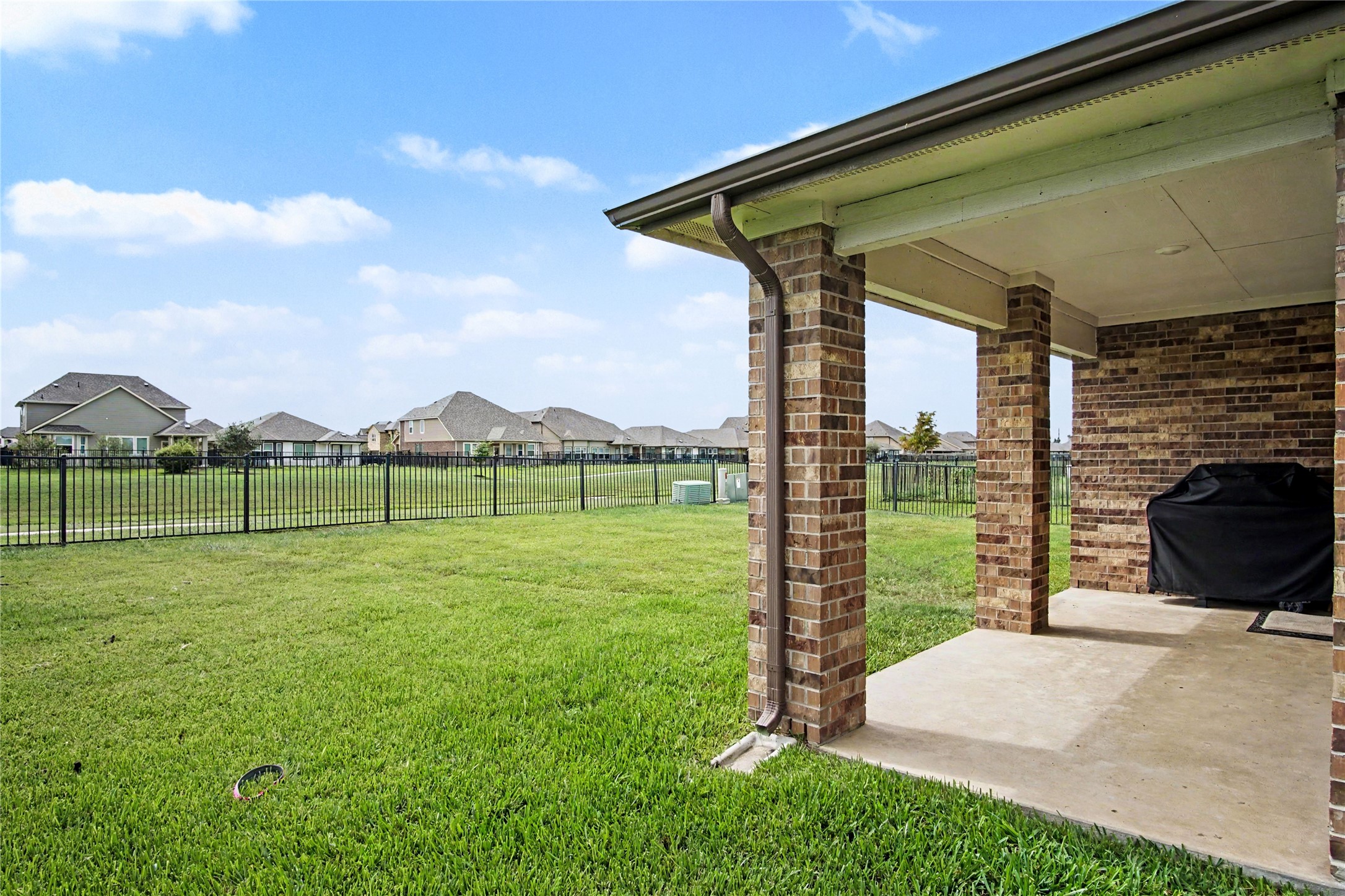 1302 Truckee River Drive Rosharon, TX 77583 - Photo 29 of 39 Beautiful outdoor space for entertaining! Covered patio with water views make this home special!