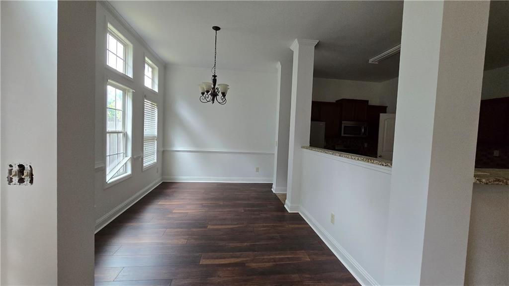 2275 Copper Trail Lane Northeast Buford, GA 30519 - Photo 13 of 39 a view of an entryway with wooden floor
