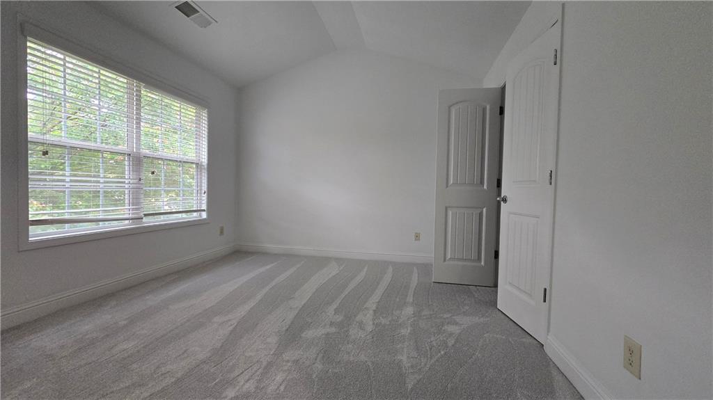 2275 Copper Trail Lane Northeast Buford, GA 30519 - Photo 22 of 39 a view of an empty room with a window