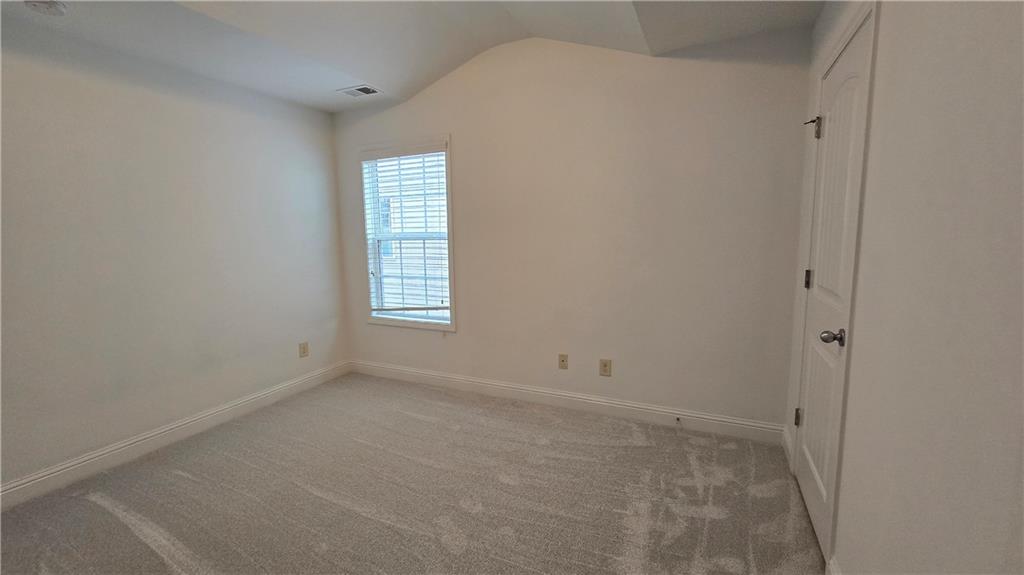 2275 Copper Trail Lane Northeast Buford, GA 30519 - Photo 32 of 39 an empty room with windows