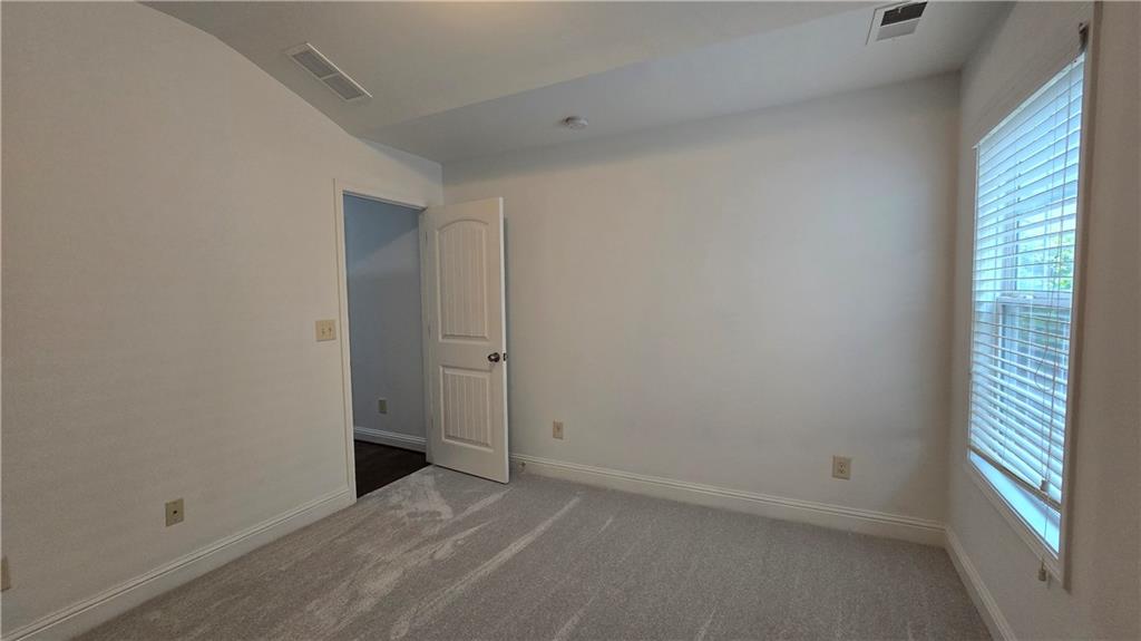 2275 Copper Trail Lane Northeast Buford, GA 30519 - Photo 33 of 39 a view of an empty room with a window