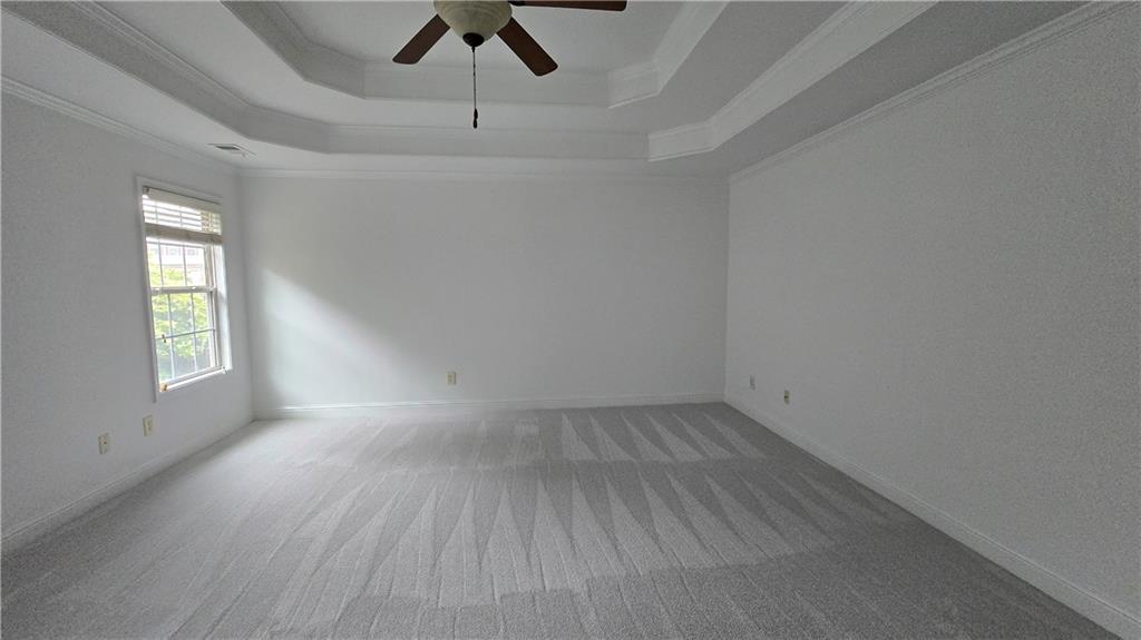2275 Copper Trail Lane Northeast Buford, GA 30519 - Photo 35 of 39 wooden floor in an empty room with a window