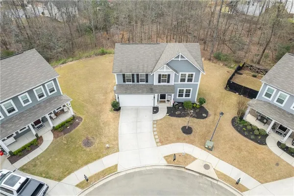 aerial view of a house with a swimming pool