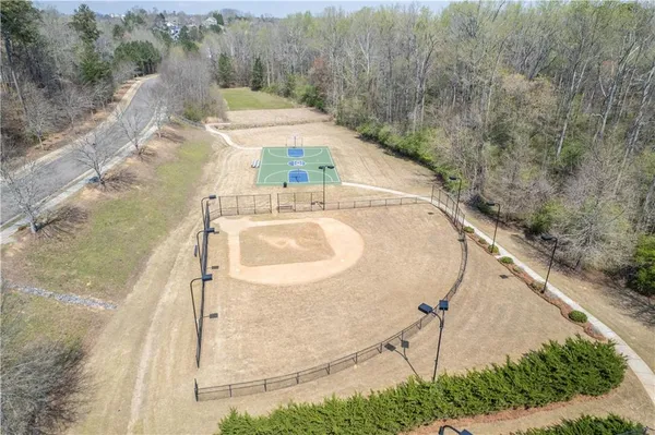 an aerial view of a house with outdoor space