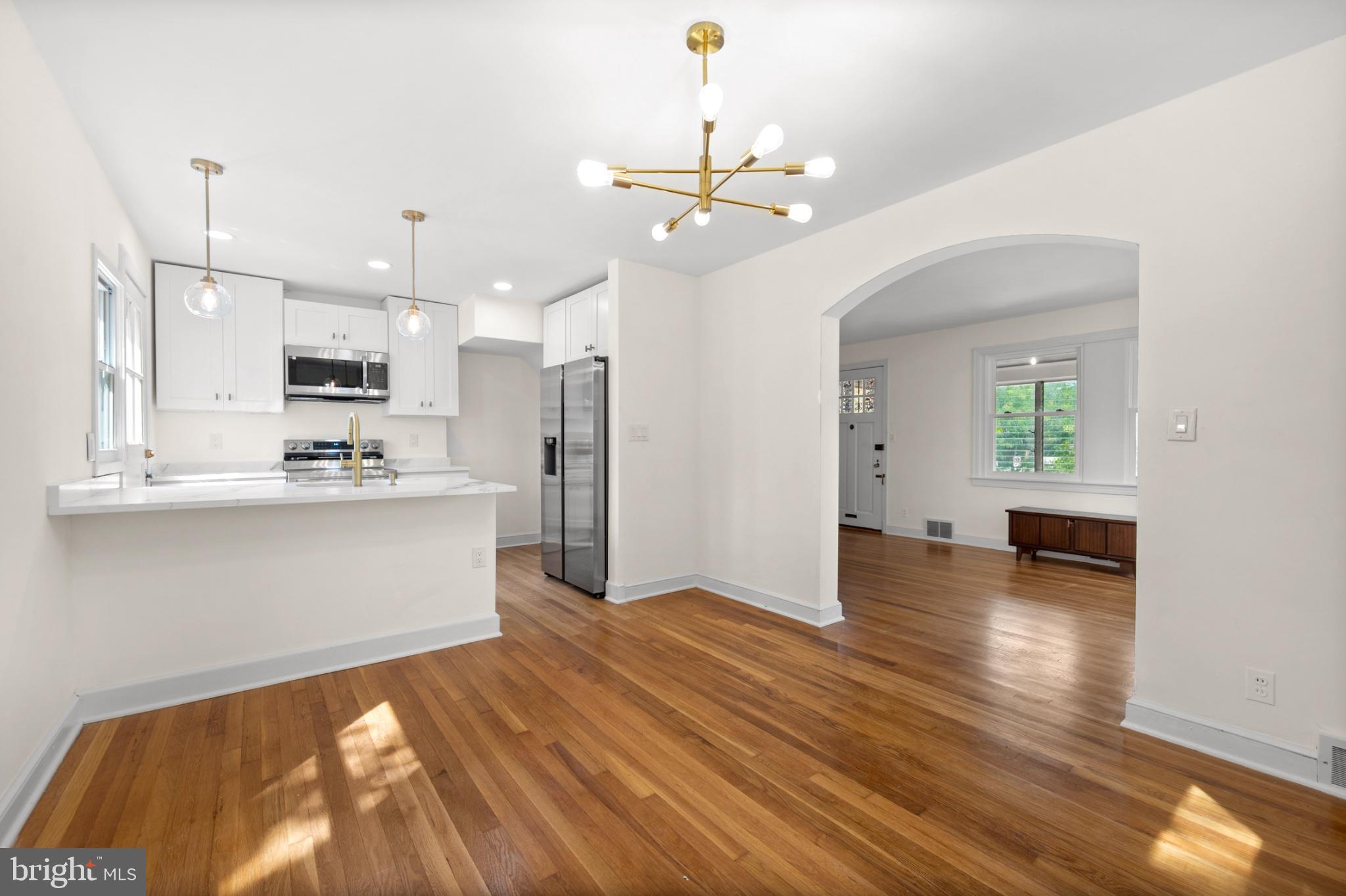 1903 R Street Southeast Washington, DC 20020 - Photo 14 of 31 Open kitchen with view of living room