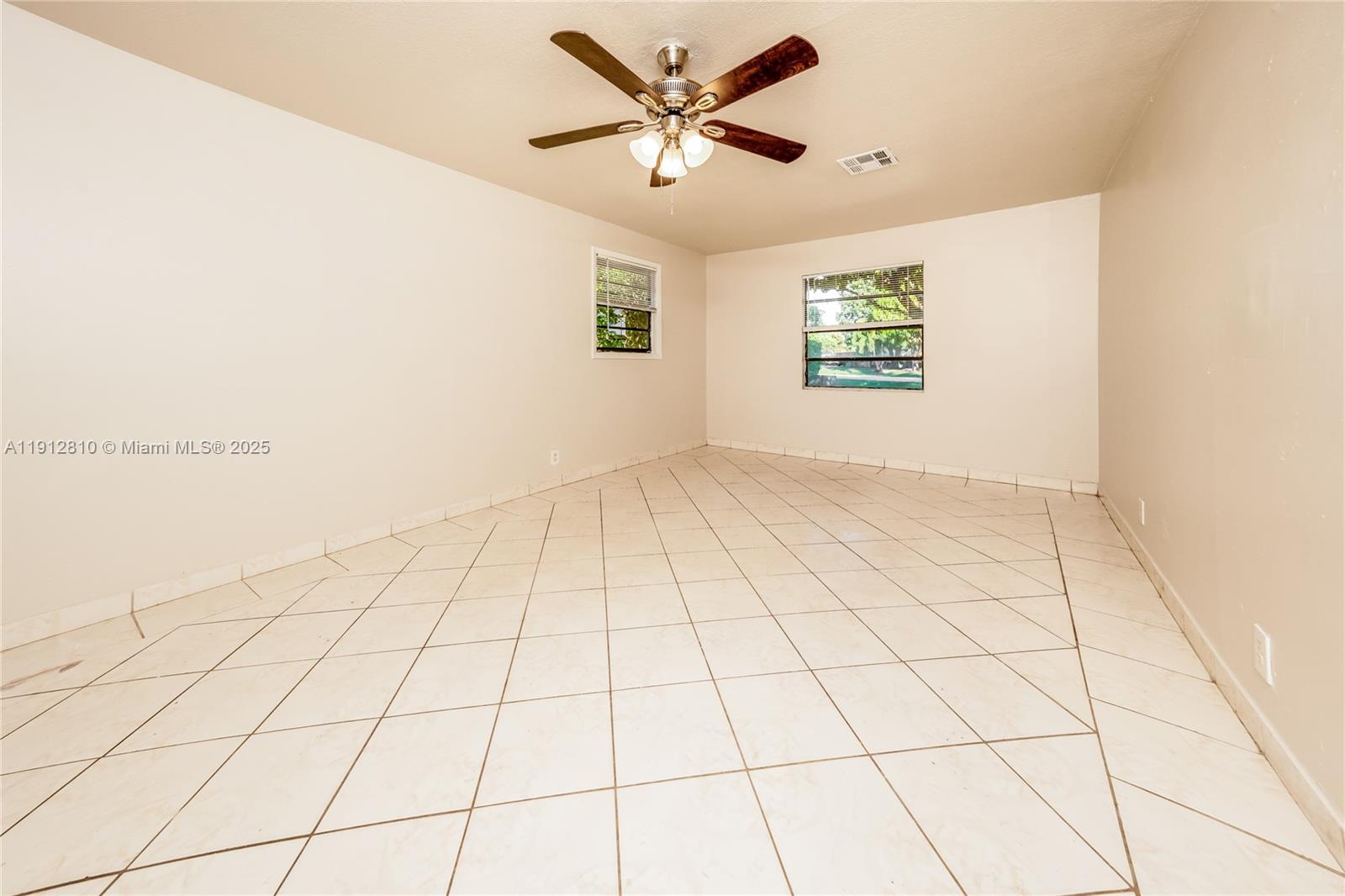 586 Udell Lane Delray Beach, FL 33445 - Photo 11 of 16 a view of an empty room