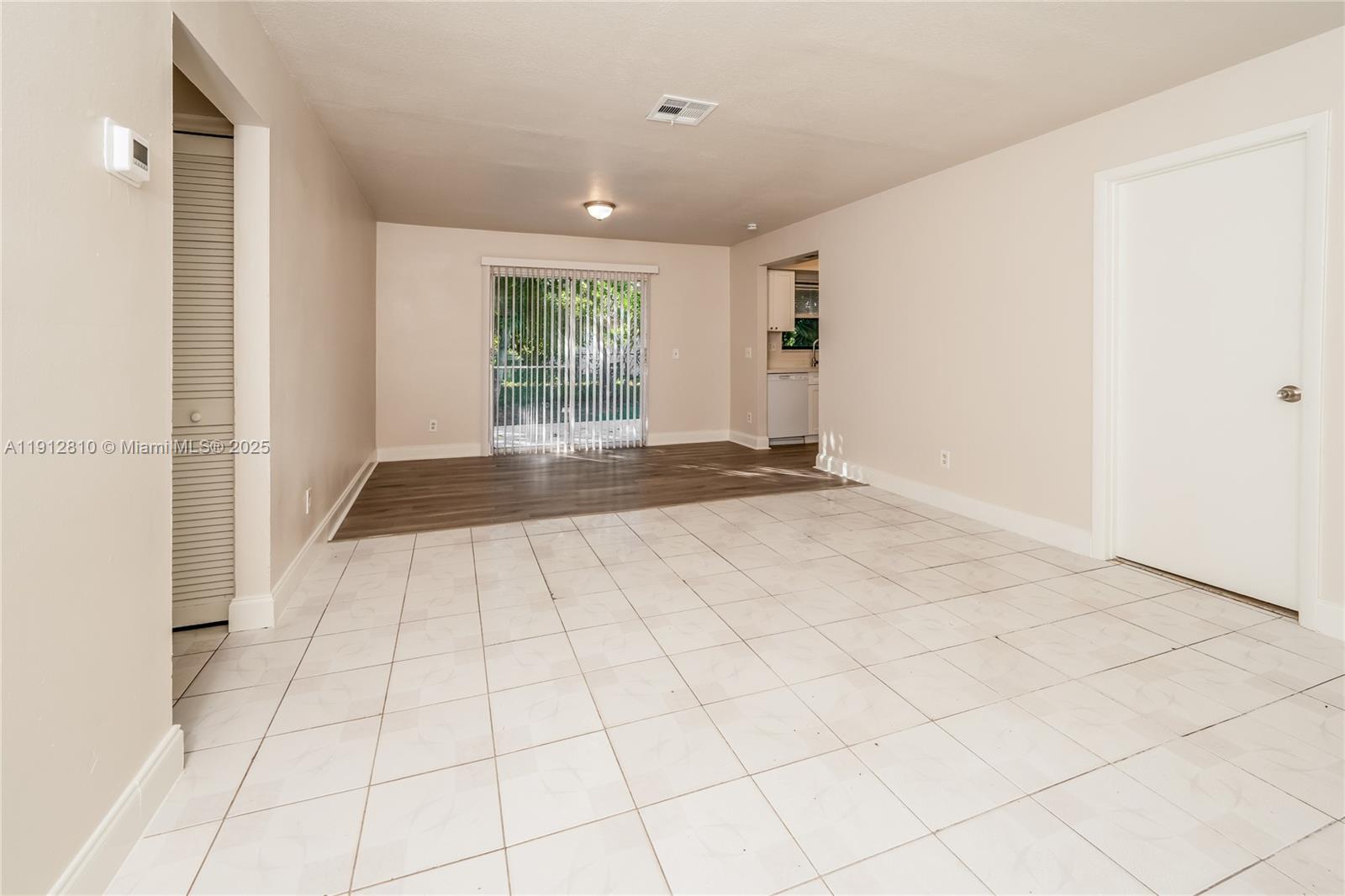 586 Udell Lane Delray Beach, FL 33445 - Photo 2 of 16 a view of an empty room and window